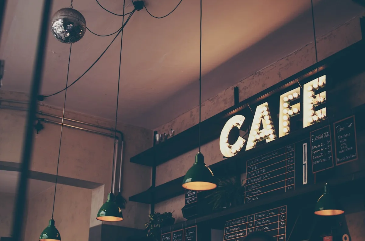 Under the cafe sign